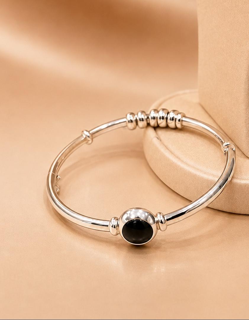 BANGLE REVERSIBLE EN PLATA CON PIEDRA NATURAL ONIX
