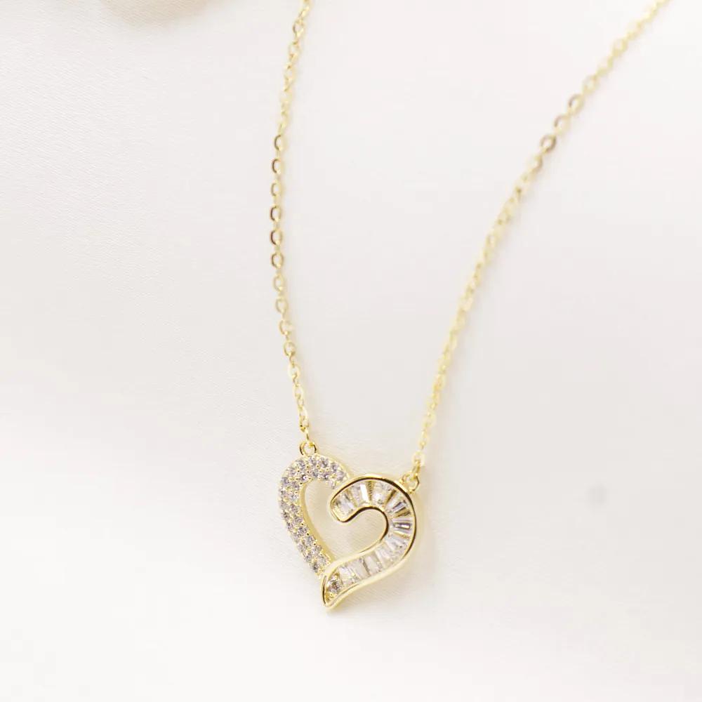 CADENA Y DIJE DE PLATA ENCHAPADA EN ORO