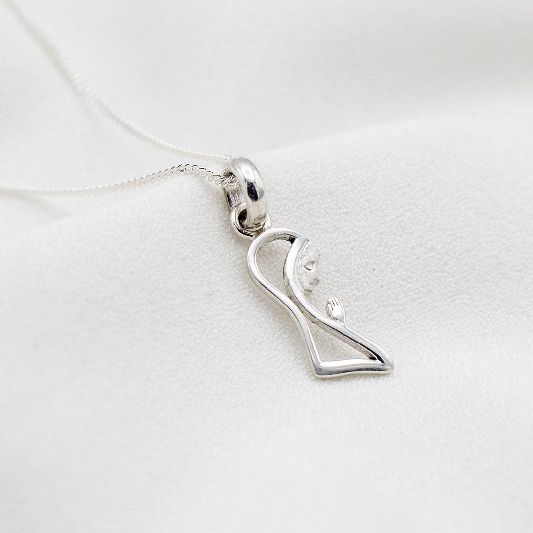 DIJE MADONNA CON CADENA DE PLATA