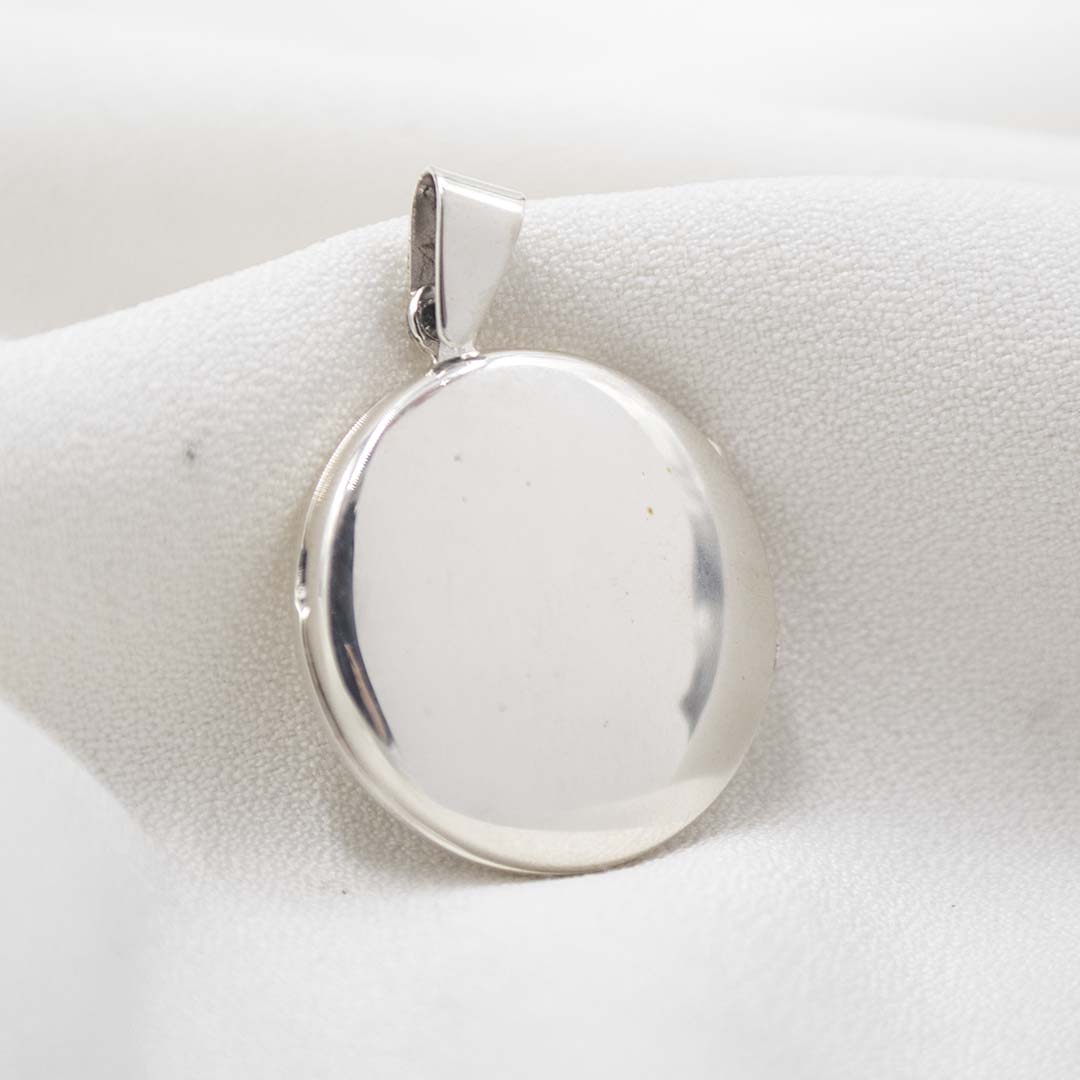 GUARDAPELO DE PLATA