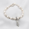 PULSERA DE PLATA CON PERLAS NATURALES