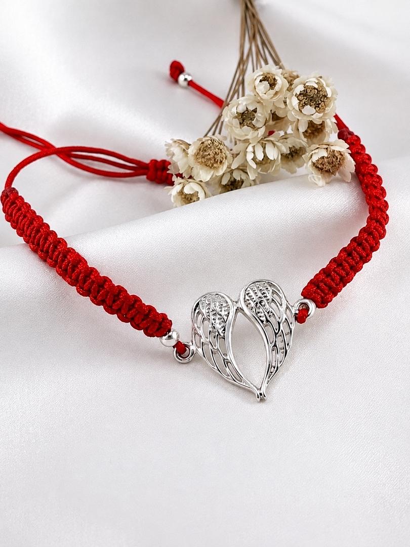 Pulsera regulable con dije de plata alas
