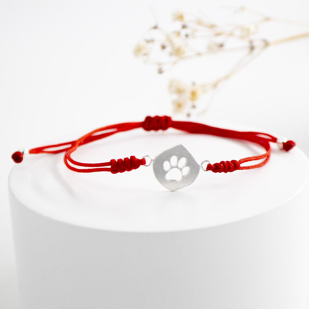 Pulsera regulable con dije de plata