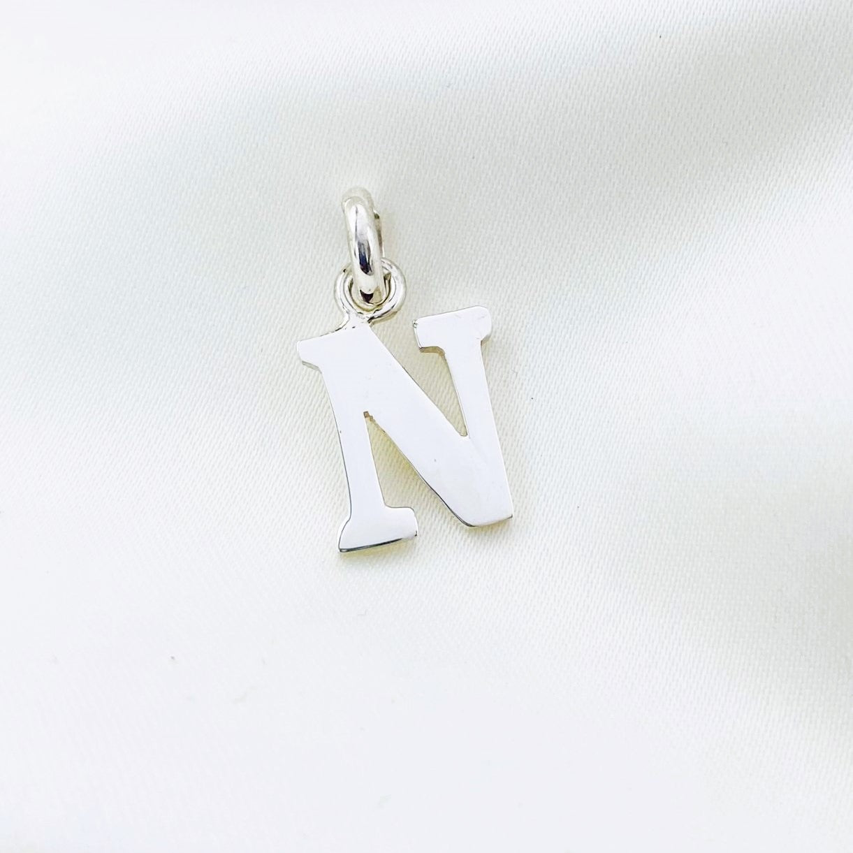 DIJE DE PLATA INCIAL  N
