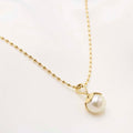 DIJE DE ORO CON PERLA NATURAL