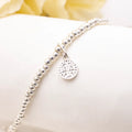 Pulsera de plata para niños con dije San Benito