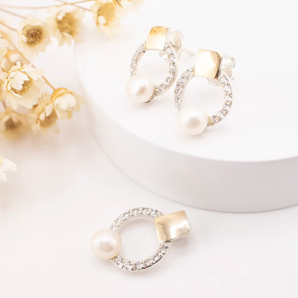 Juego de aretes y dije de plata
