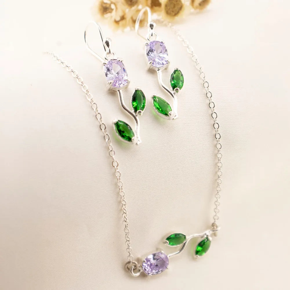 Juego de aretes y dije de plata