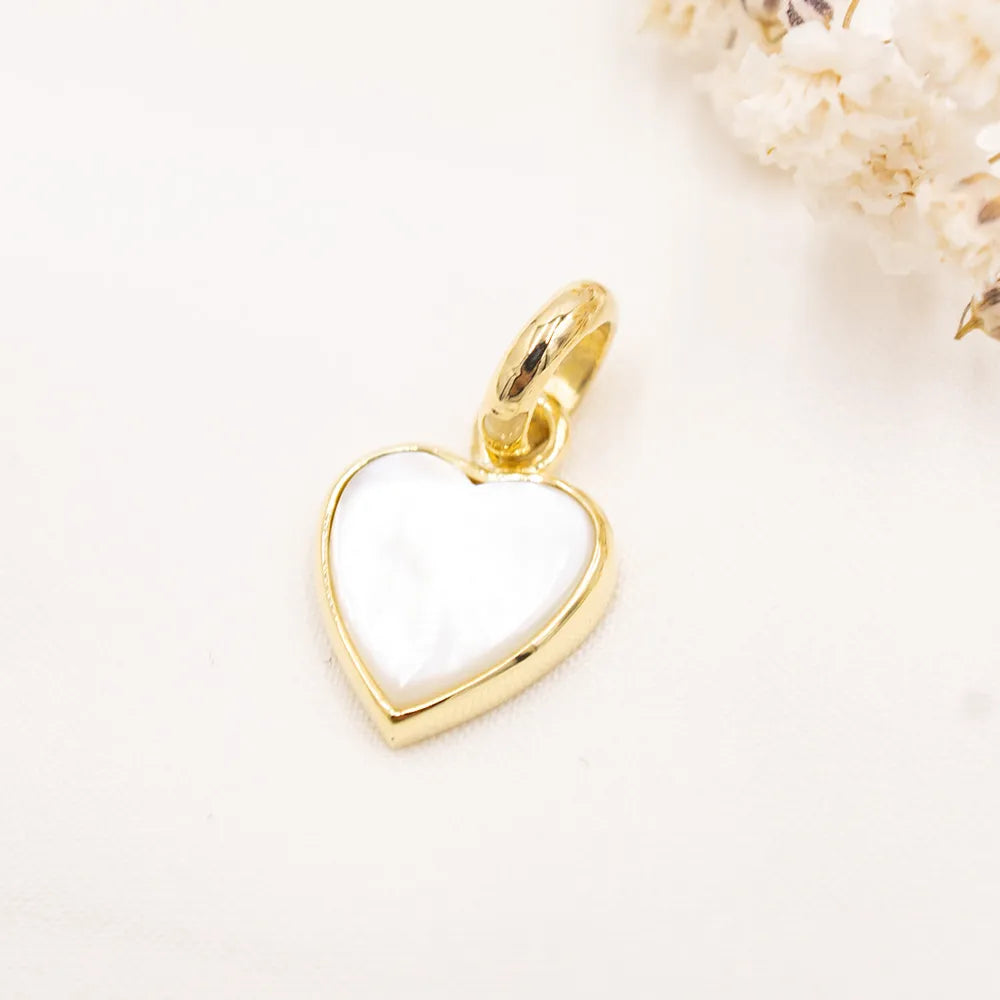 Dije de oro 18k con nácar