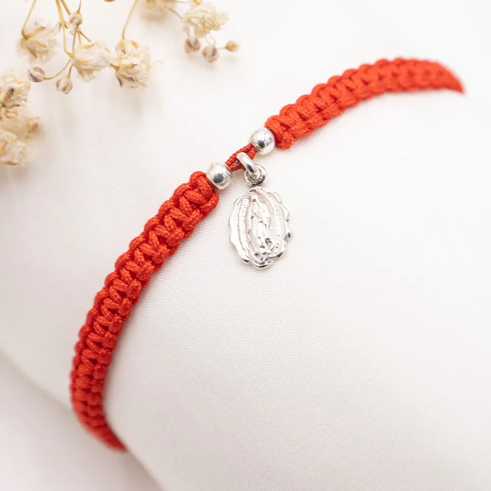 Pulsera Tejida con dije de plata de la Virgen de Guadalupe