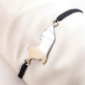 Pulsera tejida con dije Perú de plata