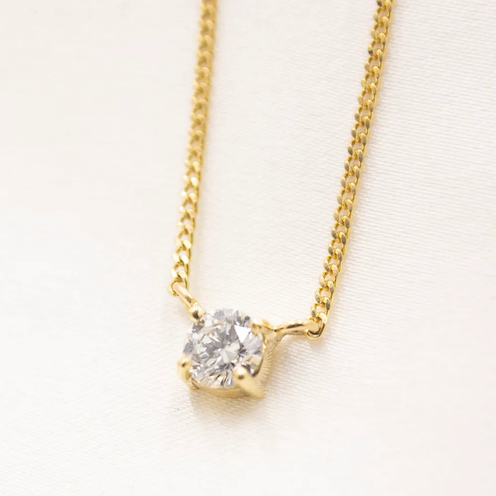 Cadena de Oro 18k con dije punto de luz