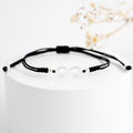 PULSERA GRADUABLE CON DIJE DE PLATA INFINITO